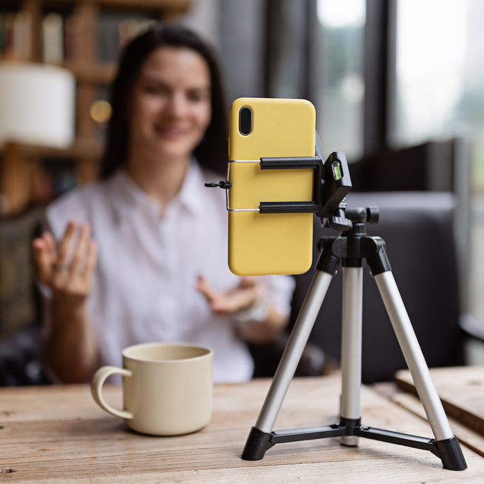 Women shooting vlog on iPhone